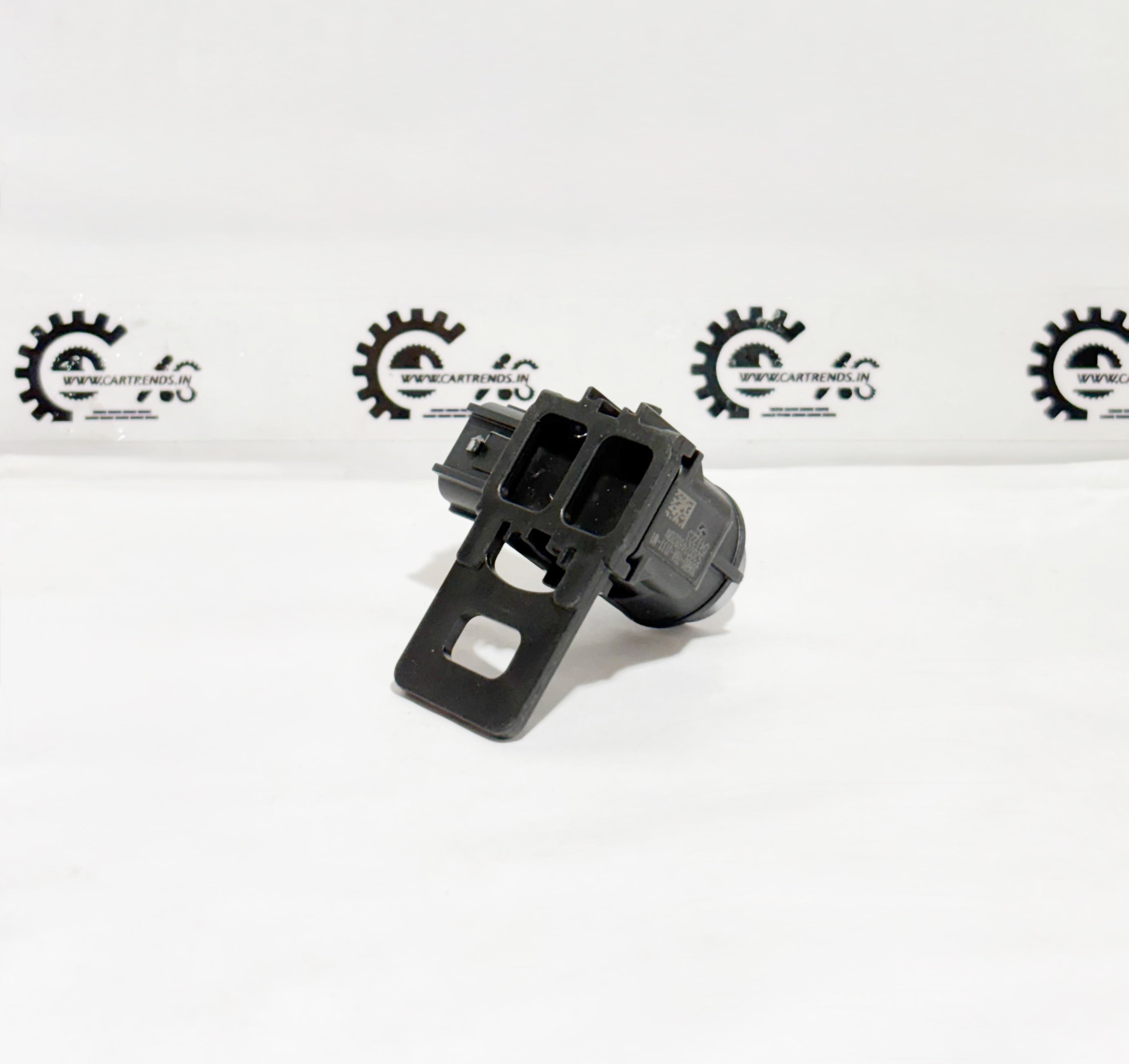 Honda parking sensor assembly with clip, showing the back view of the sensor for vehicle parking assistance.