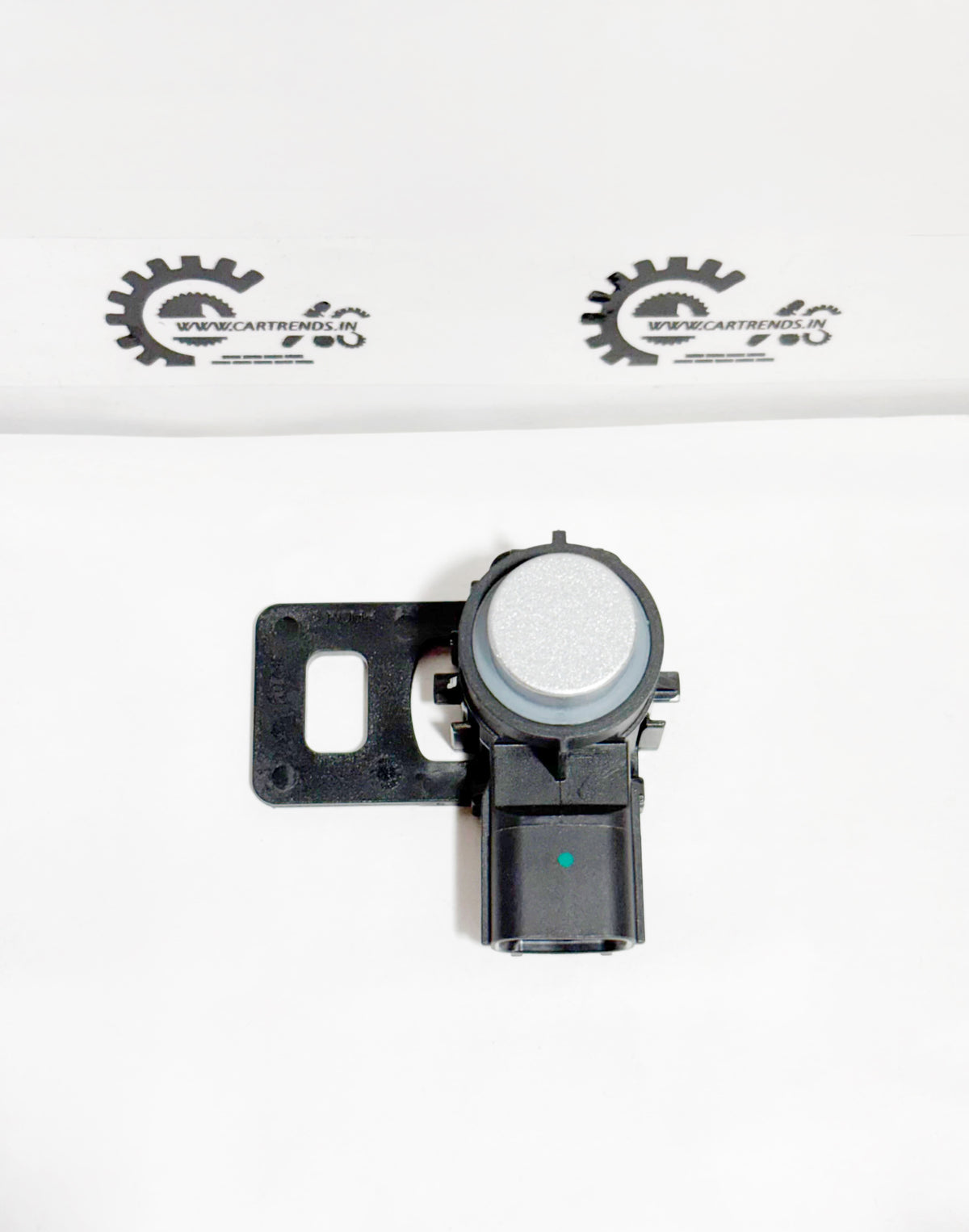 Honda parking sensor assembly with clip, front view showing sensor and wiring for vehicle parking assistance.