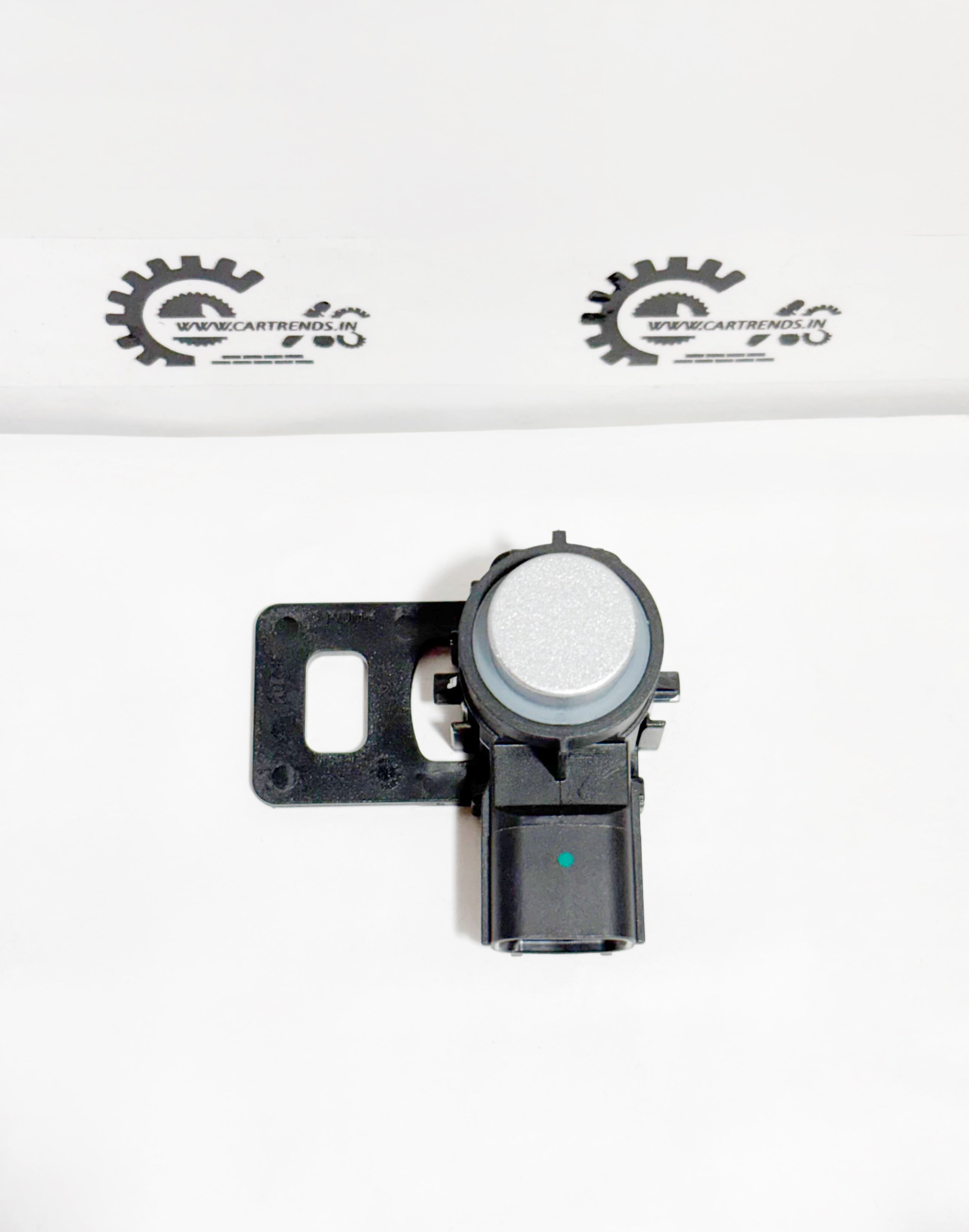 Honda parking sensor assembly with clip, front view showing sensor and wiring for vehicle parking assistance.