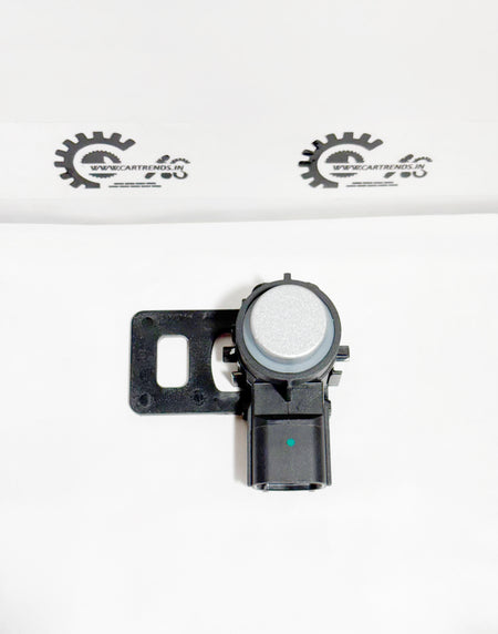 Honda parking sensor assembly with upward clip, front view showcasing the sensor and mounting clip component.