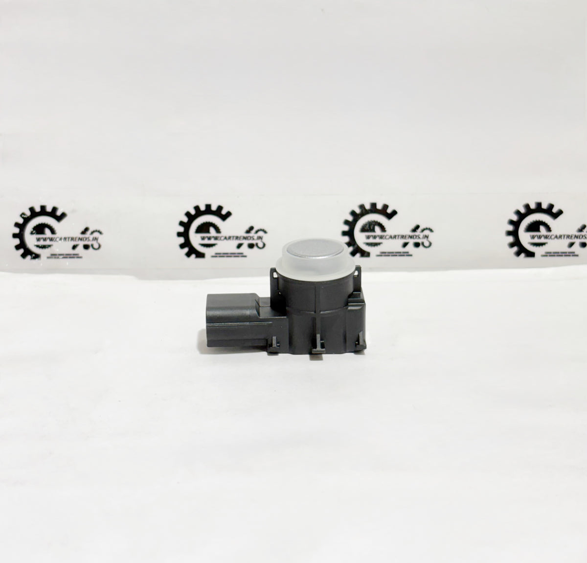 Honda parking sensor assembly, front view, without CL 39680T6AJ01ZM, mounted on vehicle bumper for parking assistance.