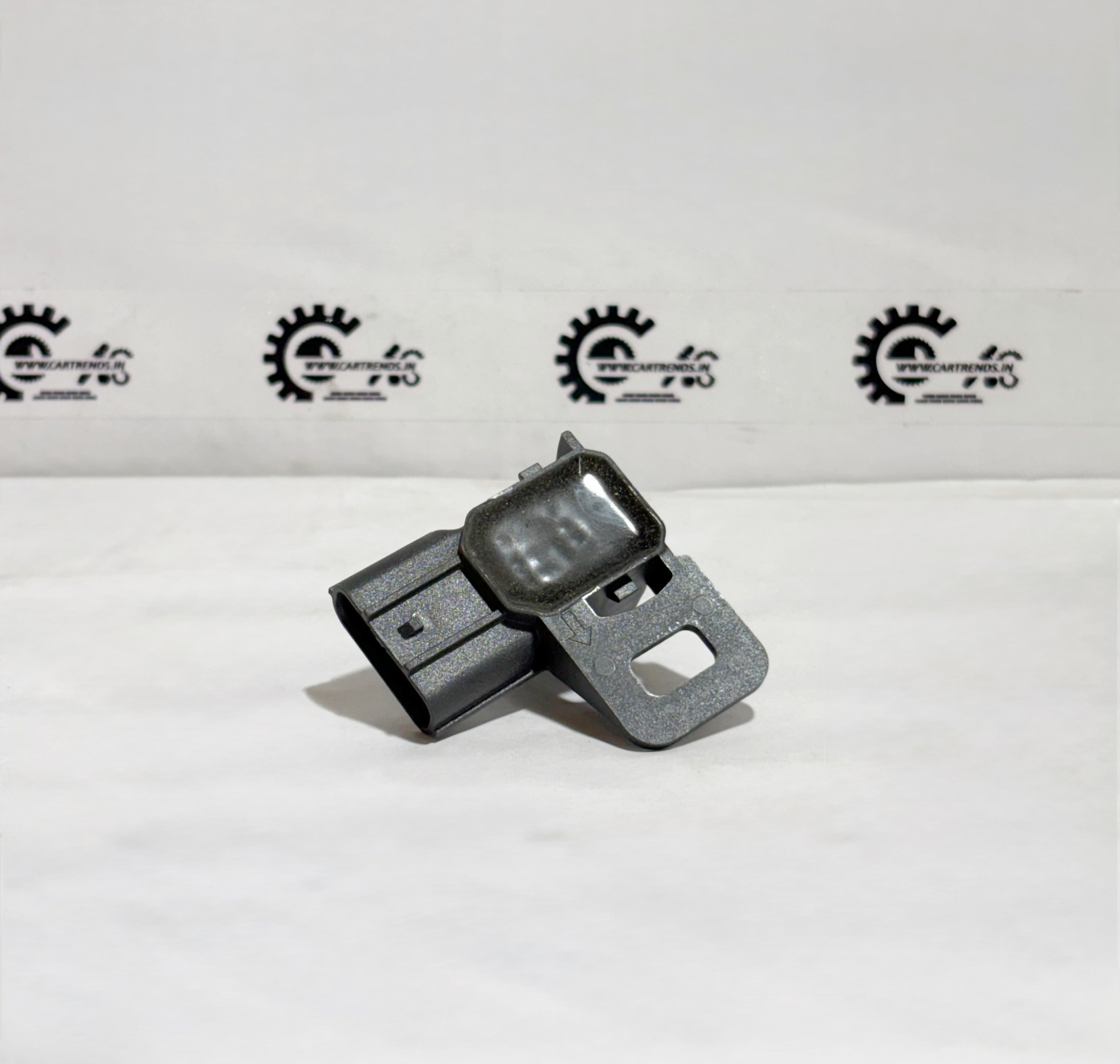 Honda parking sensor assembly with clip, shown from the back, part number 39680TSVW11ZH for vehicle safety and parking assistance.