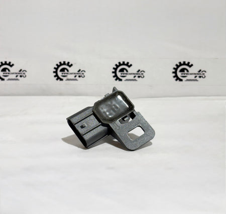 Honda parking sensor assembly with clip, shown from the back, part number 39680TSVW11ZH for vehicle safety and parking assistance.