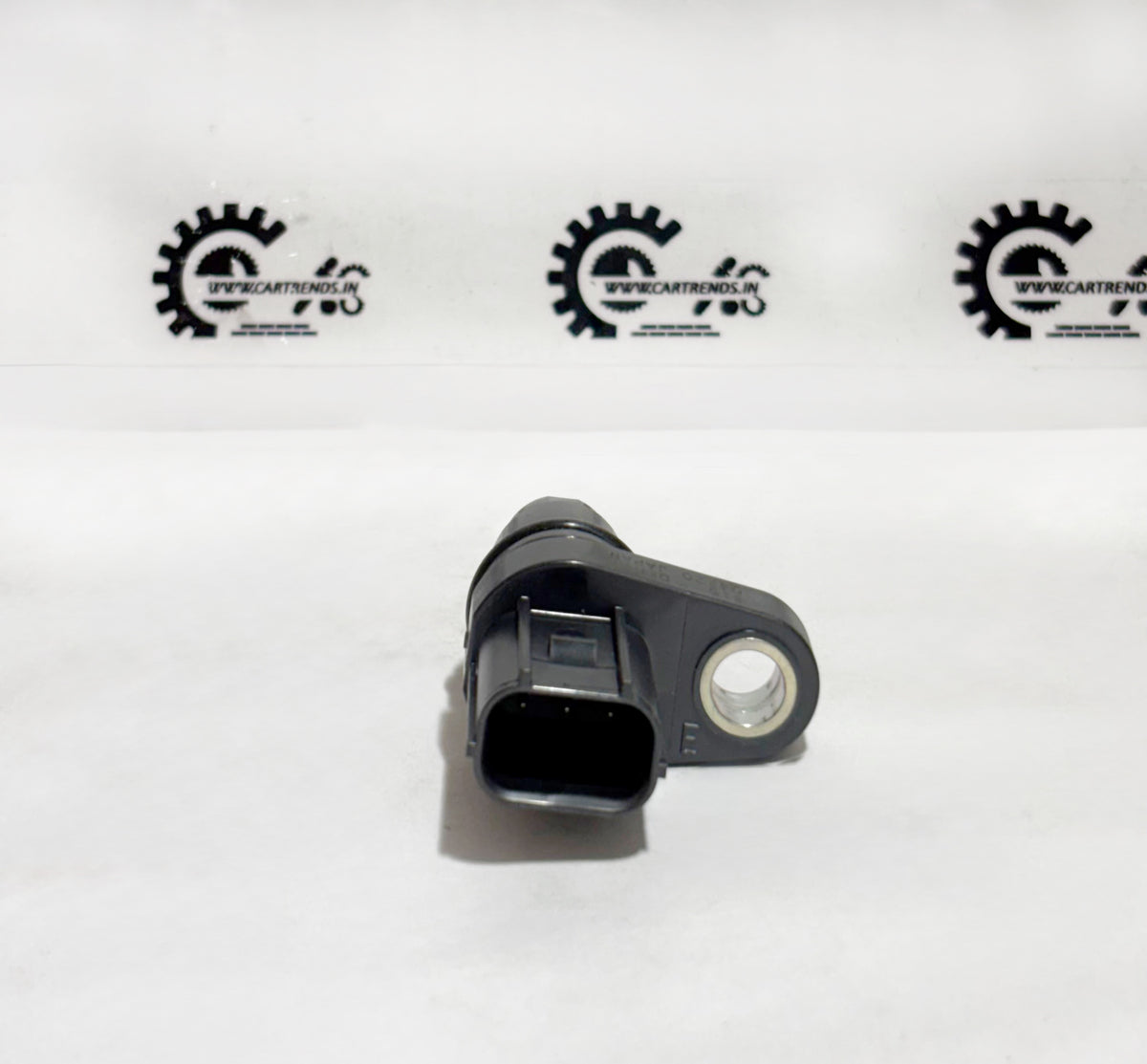 Honda TDC sensor assembly, model 375105A2A01, showing the back view with electrical connectors and sensor components.