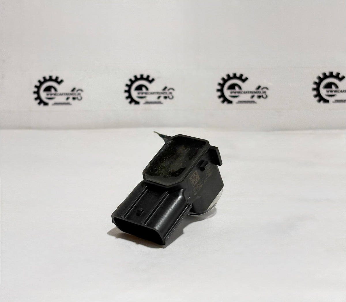Honda sensor NH797M 39680TSVW01ZE shown from the back, designed for vehicle monitoring and diagnostic systems.