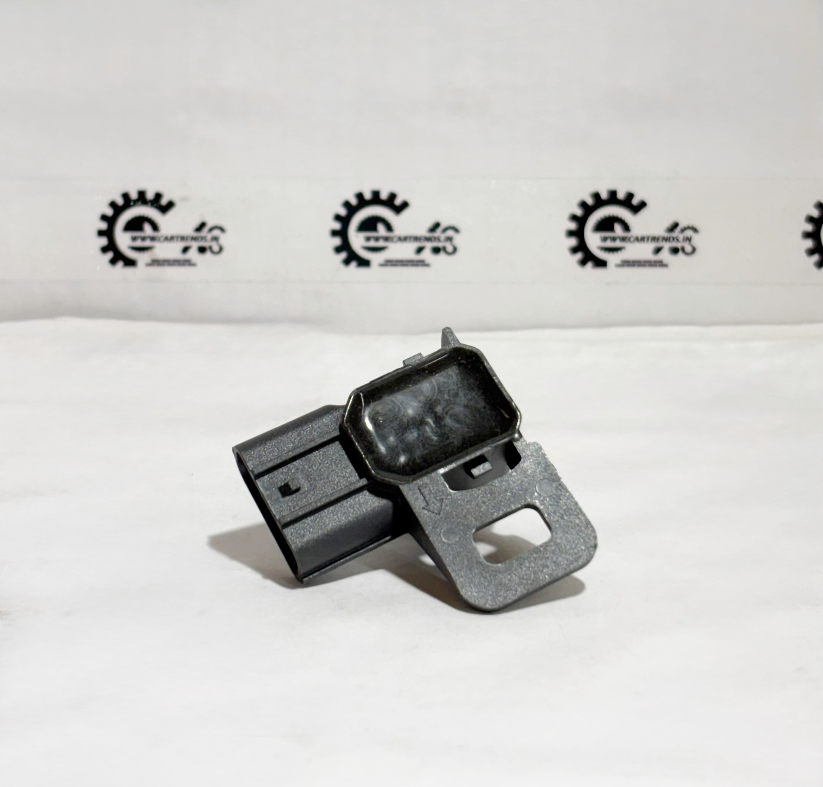Honda NH797M sensor showing the back view with electrical connectors and sensor components for vehicle diagnostics.