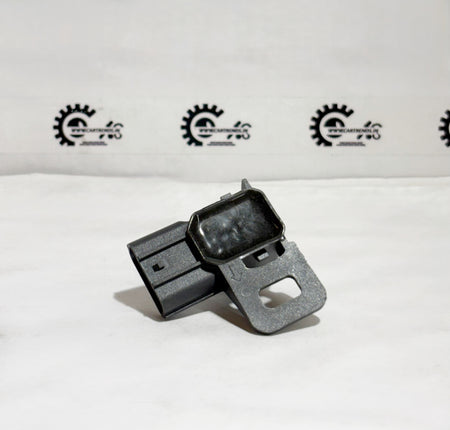 Honda NH797M sensor showing the back view with electrical connectors and sensor components for vehicle diagnostics.