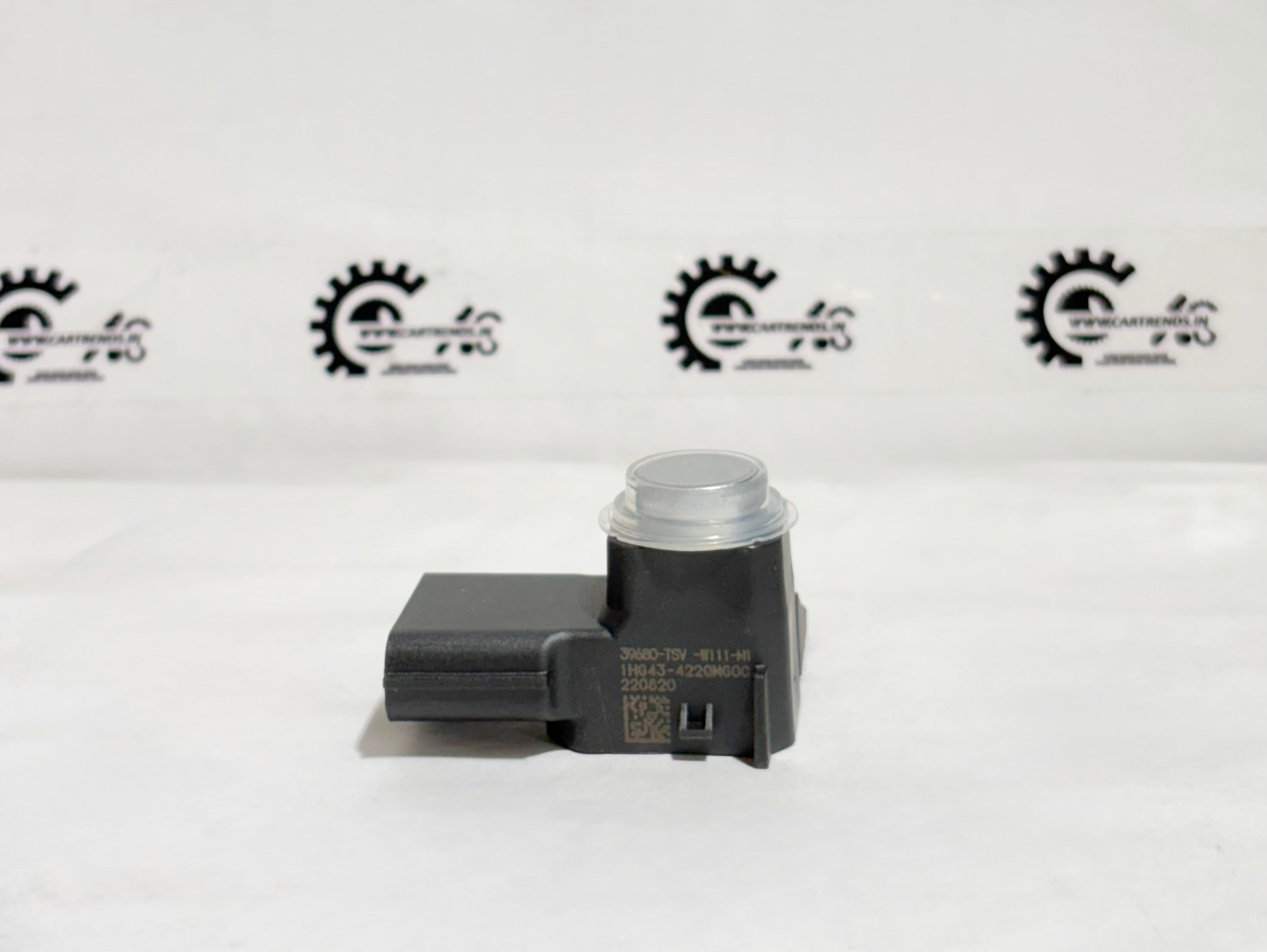 Honda SENSOR AS NH830M 39680TSVW11ZD, automotive sensor part for Honda vehicles, shown from the left side.