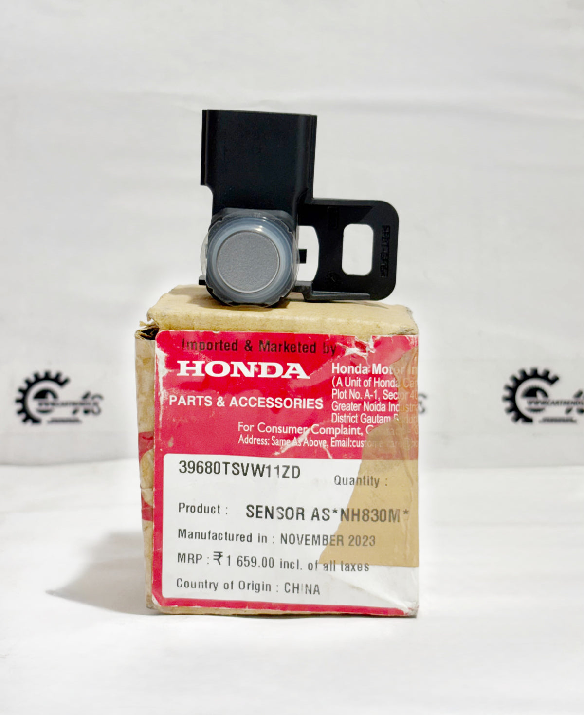 Honda NH830M sensor for vehicle, shown on the right side, with part number 39680TSVW11ZD, designed for Honda models