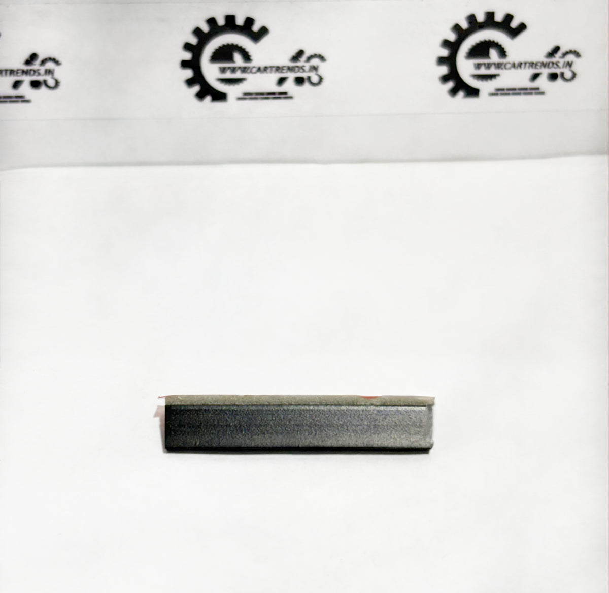 Honda spacer for rear windshield, part number 73226ST8000, shown installed on the vehicle's rear windshield area.