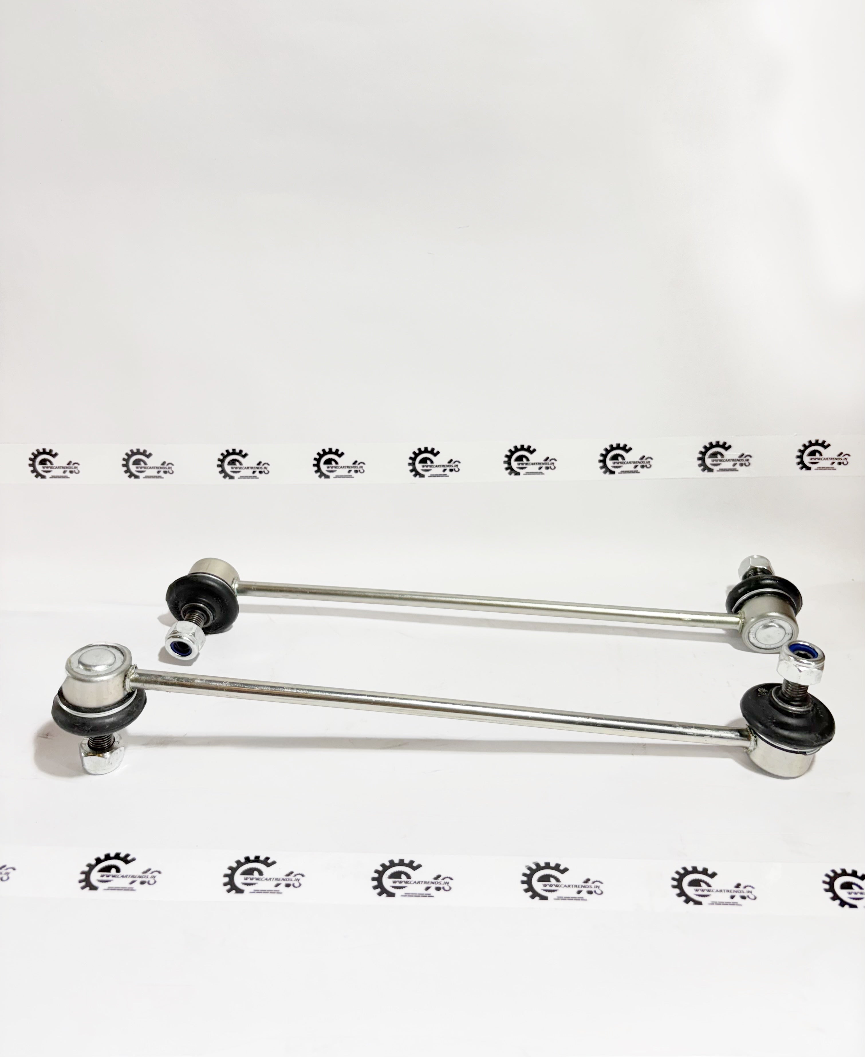Autokoi stabilizer link assembly pair for Tata vehicles, showing two black metal stabilizer links with mounting points.