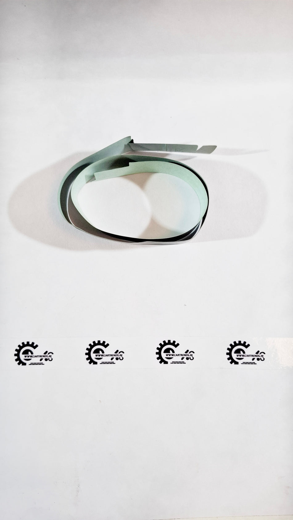 Honda Jazz first-generation upper door sash tape, CarTrends, shown on the back of the part with adhesive tape visible.