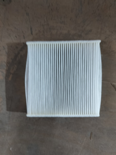 Aftermarket AC filter Swift NM 95861M74L00TL installed in vehicle for improved air quality and system performance