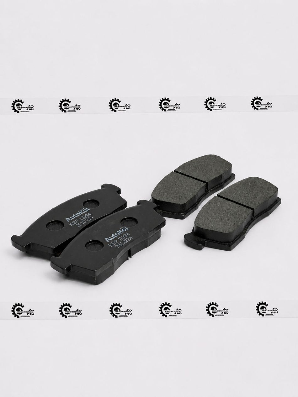 AUTOKOI brake pads and shoe KBPF17001, automotive brake components, shown in a close-up image with detailed surface texture.