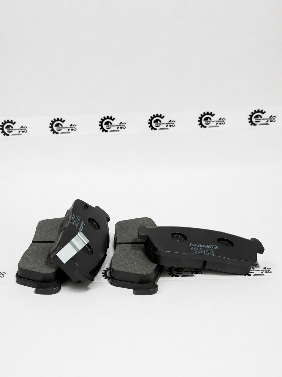 AUTOKOI brake pads and shoe KBPF17005, automotive brake components with detailed metal and friction surface visible.