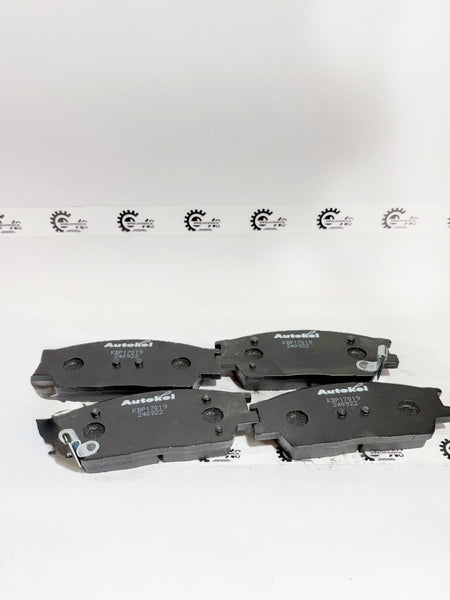 AUTOKOI brake pads and shoe model KBPF17019, automotive brake components with detailed surface texture and packaging.