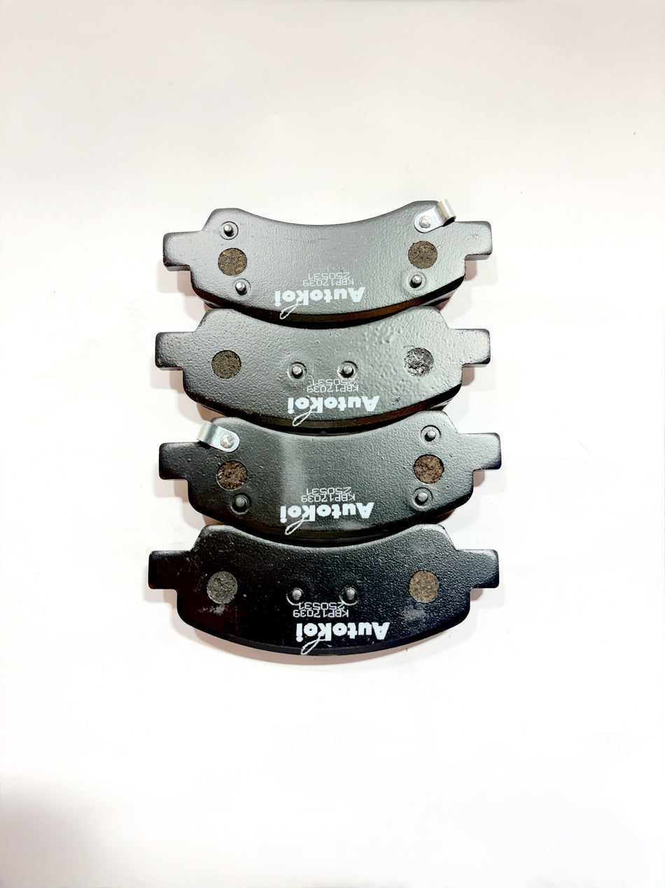 AUTOKOI brake pads and shoe KBPF17039, automotive brake components with detailed metal and friction material visible.