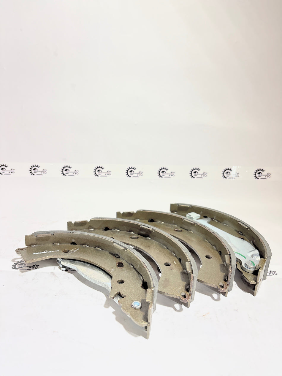 AUTOKOI brake pads and shoe set KBPF17319, automotive brake components, shown in black with metal backing plates.