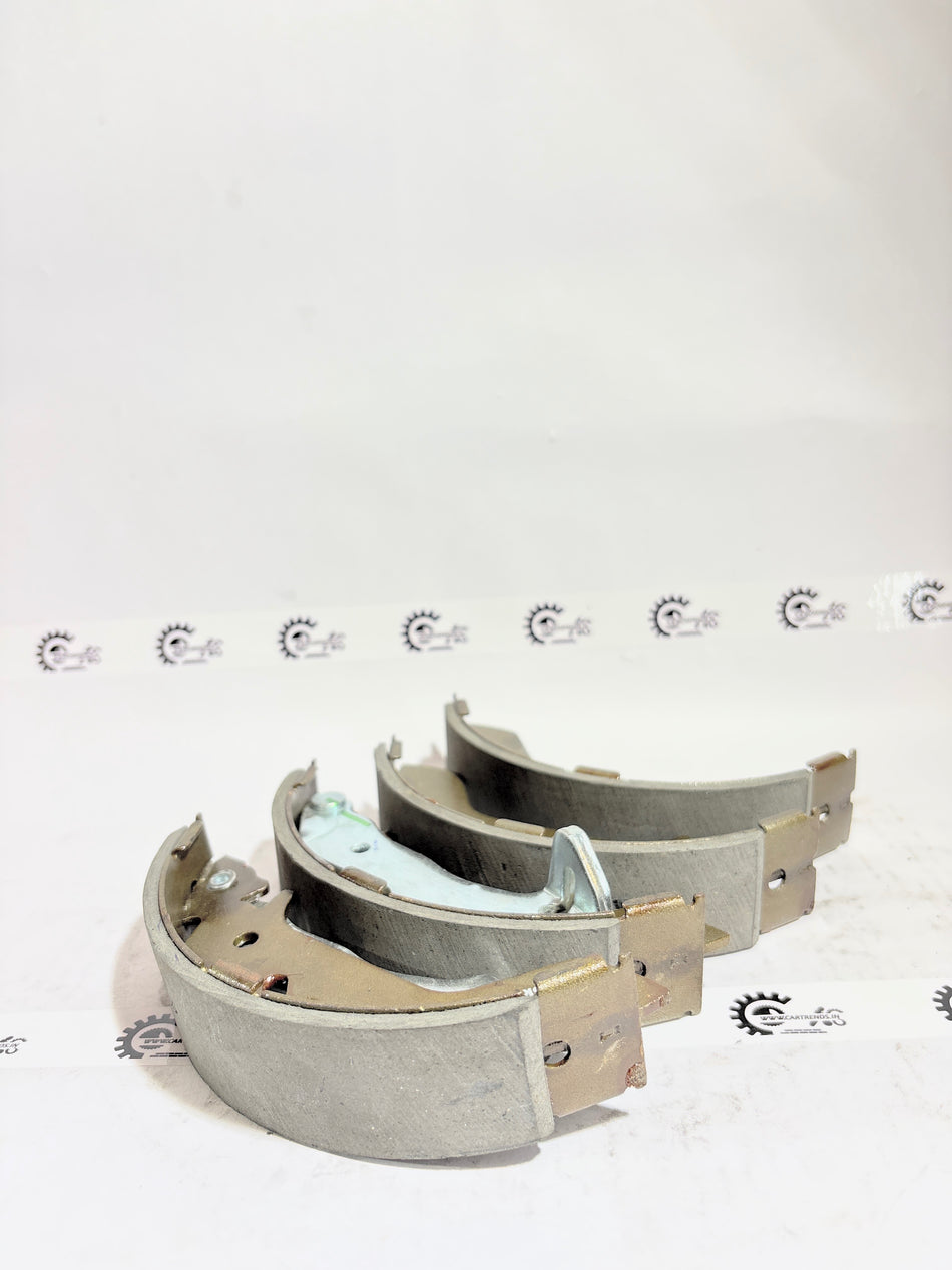 AUTOKOI brake pads and shoe KBPF17322, automotive brake component with detailed metallic and rubber parts visible.
