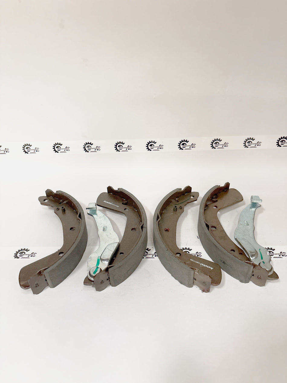 AUTOKOI brake pads and shoe KBPF17326, automotive brake components with detailed metal and rubber parts.