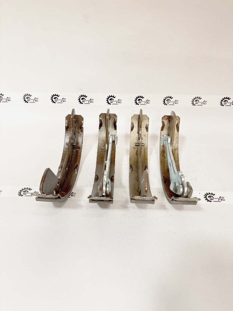 AUTOKOI brake pads and shoe KBPF17326, automotive brake component with detailed metal and friction surface visible.