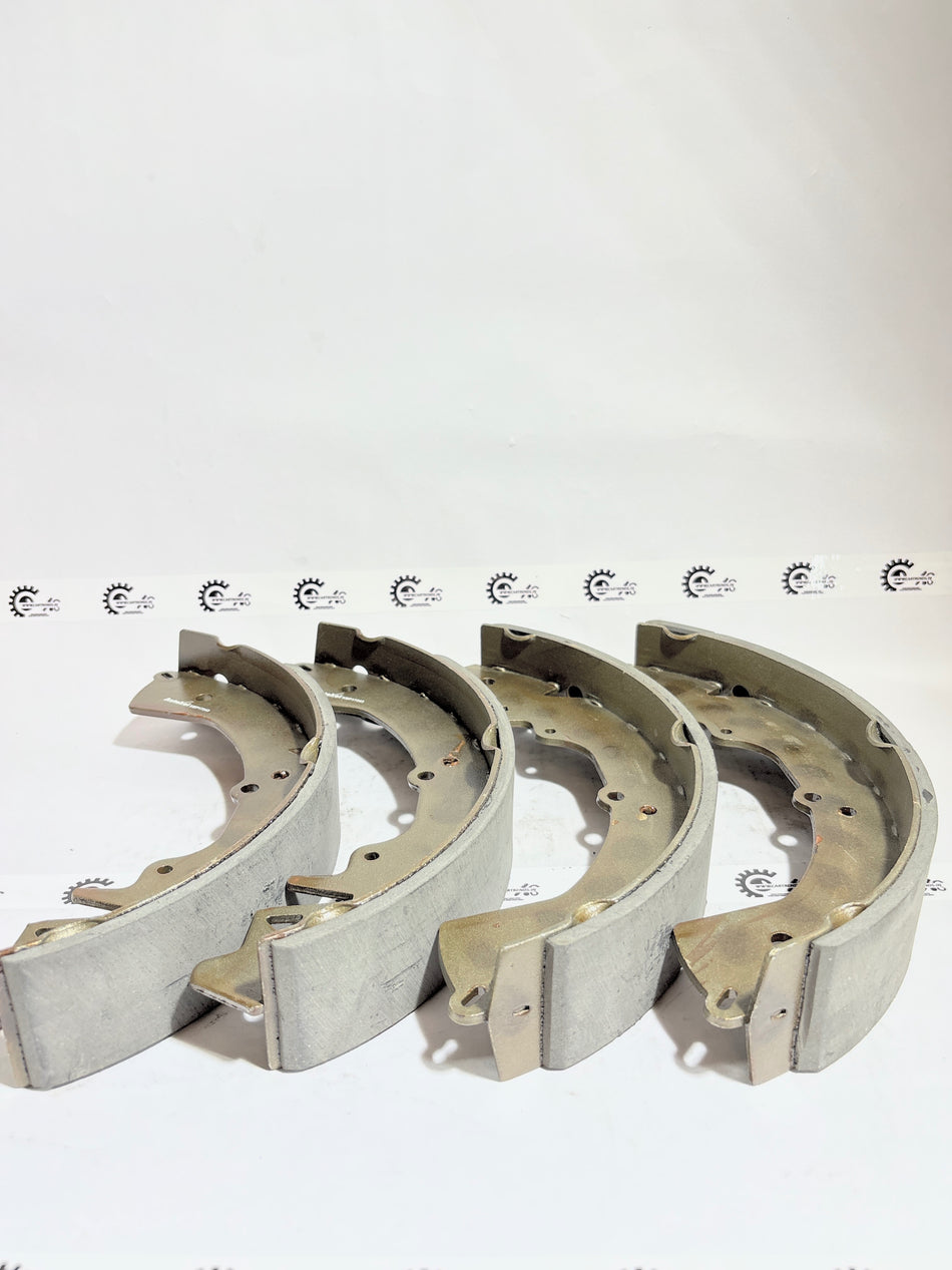AUTOKOI brake pads and shoe KBPF17343 for vehicle braking system, shown in a close-up image with metal and friction material.