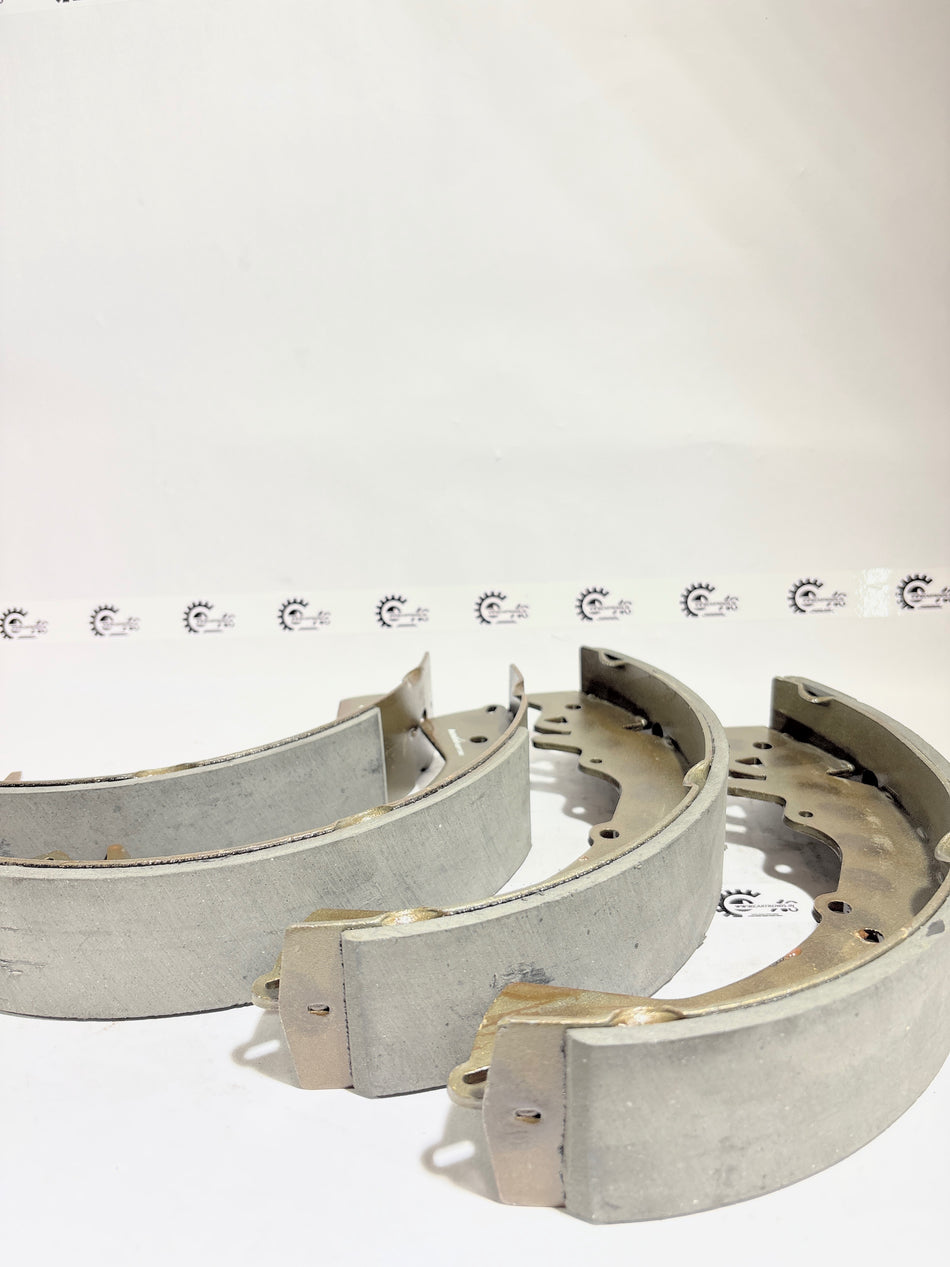 AUTOKOI brake pads and shoe KBPF17343, automotive brake component with detailed metal and rubber parts visible.