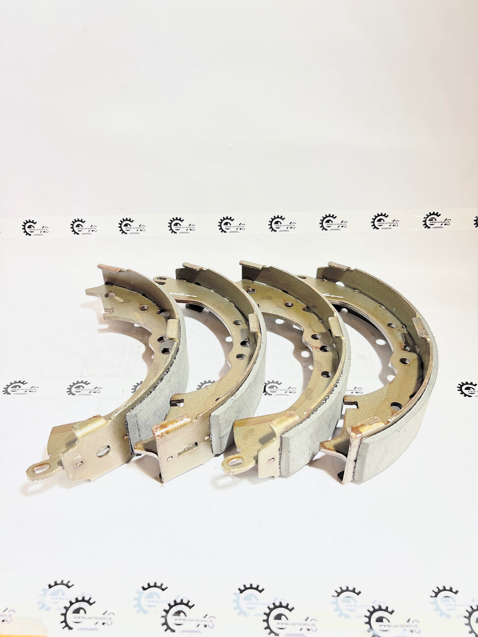 AUTOKOI brake pads and shoe KBPF17344, automotive brake components with detailed metal and rubber parts visible.