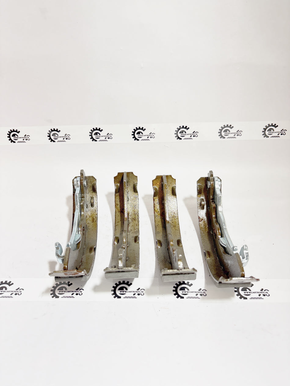 AUTOKOI brake pads and shoe KBPF17353, automotive brake components with detailed surface finish and mounting features.