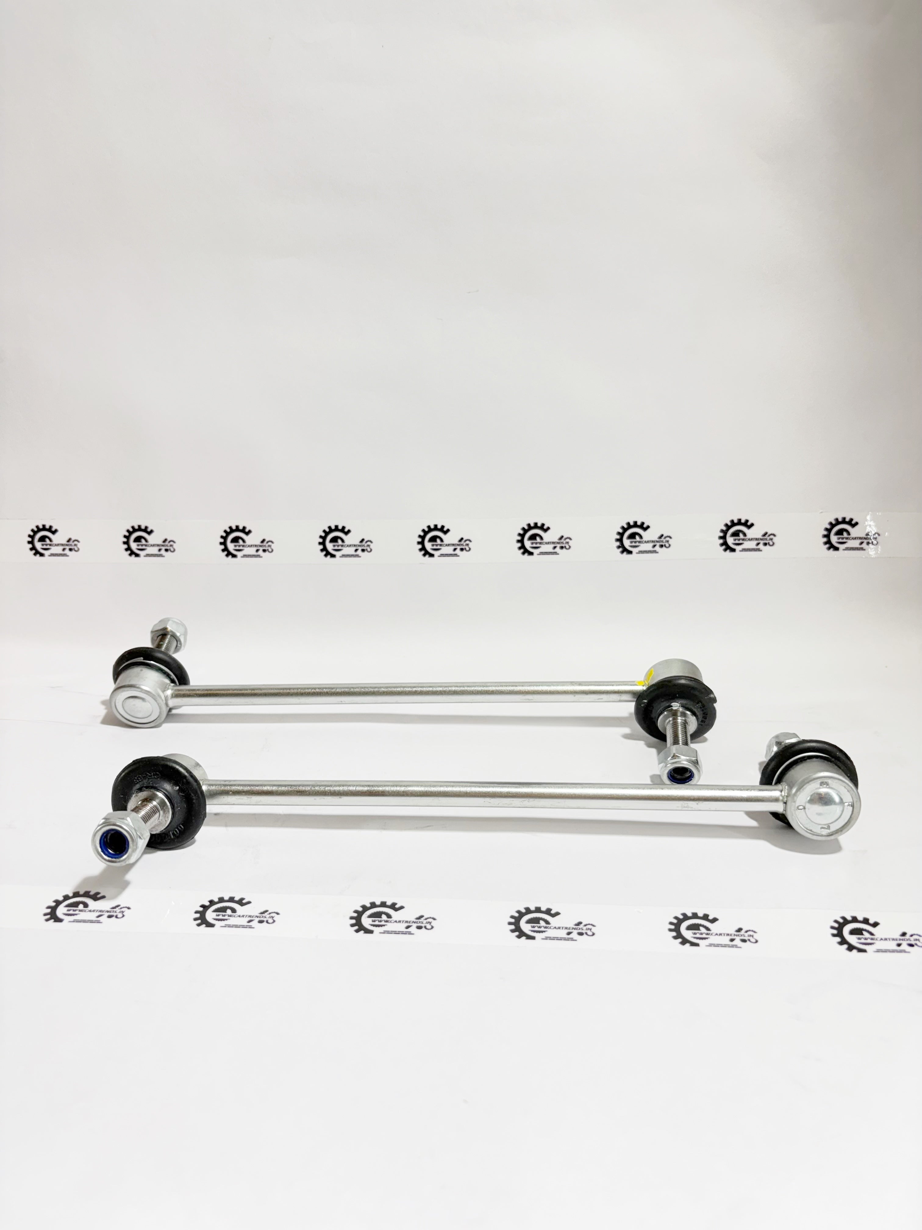 AUTOKOI front stabilizer link assembly set KFOF12010 for vehicle suspension, showing metal components and mounting points.