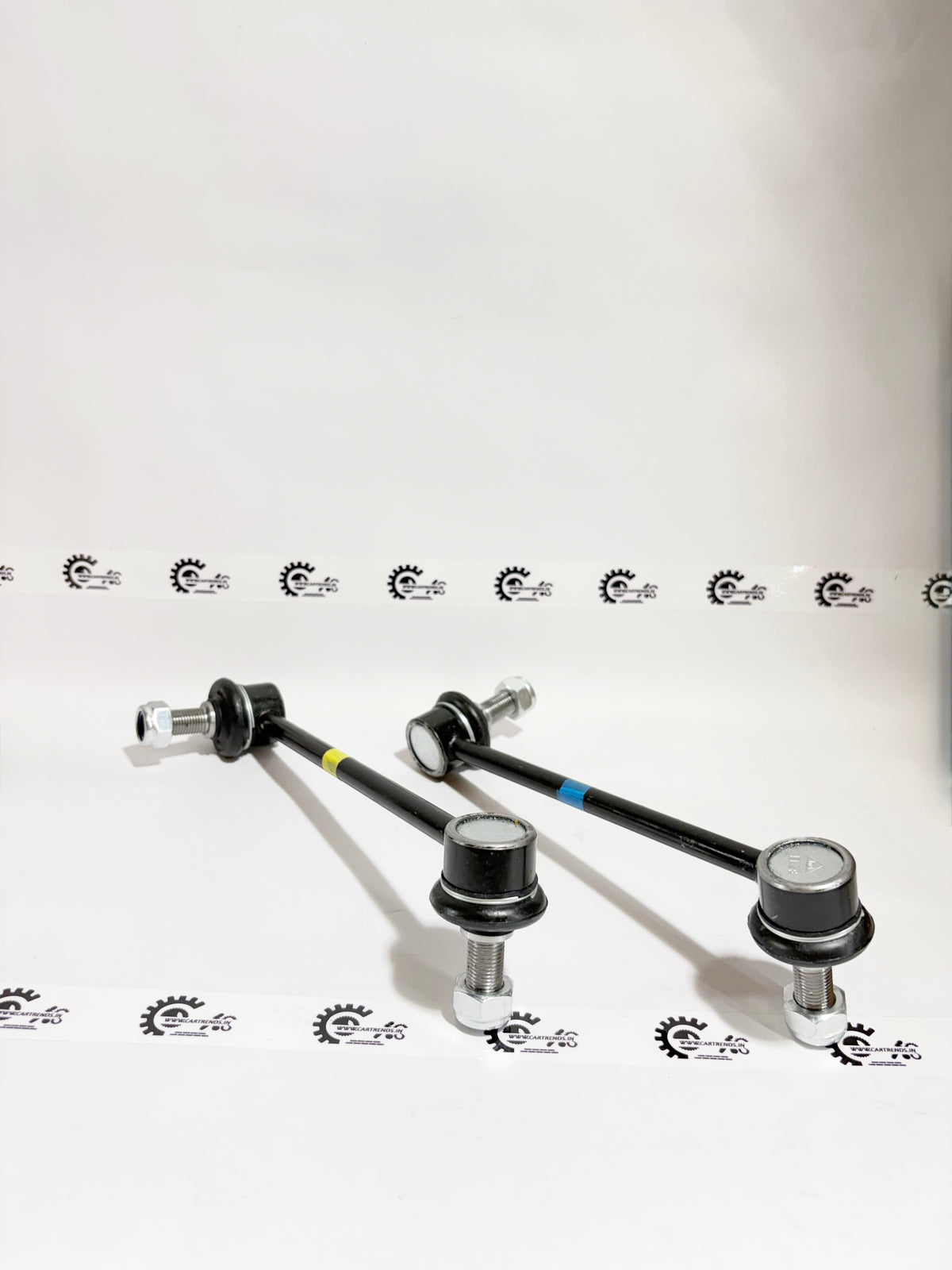 AUTOKOI rear stabilizer link assembly pair, automotive suspension component with black metal links and mounting bushings.