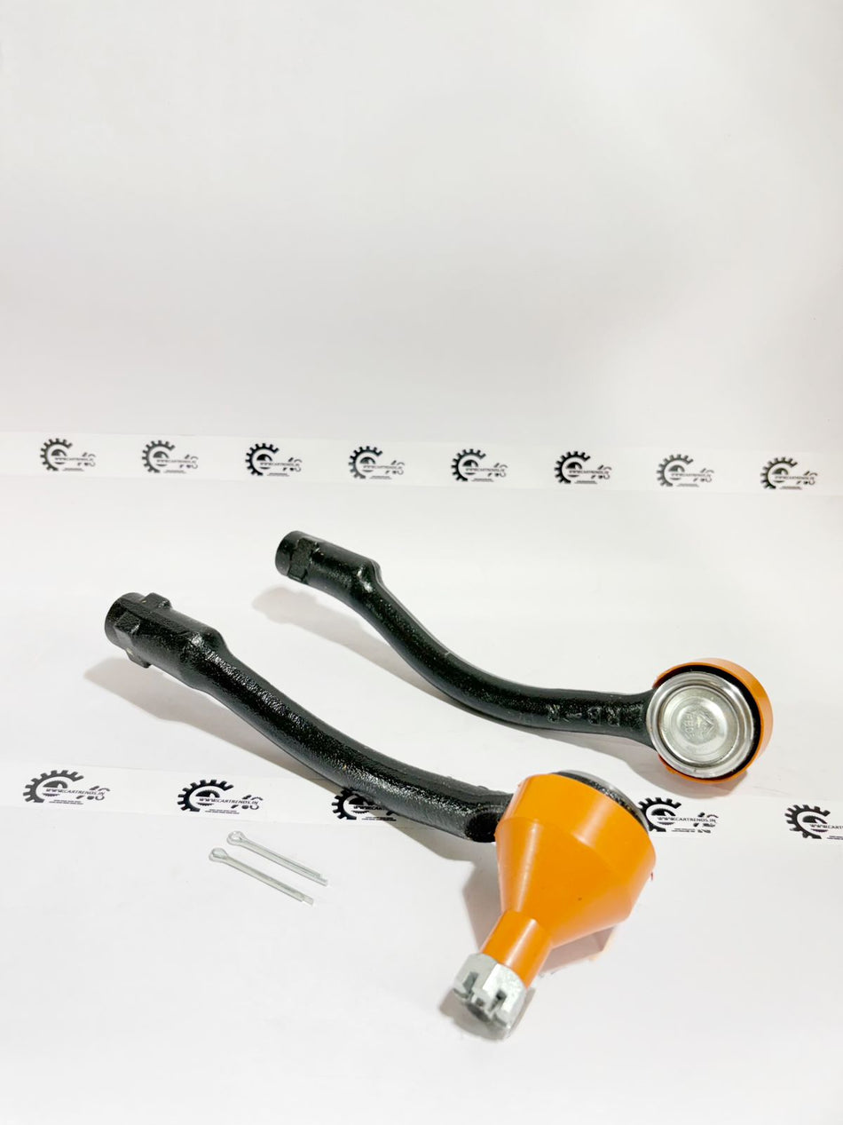 AUTOKOI Tie Rod End Assembly Pair KHMF2083 for vehicle steering, with visible metal components and rubber boots.