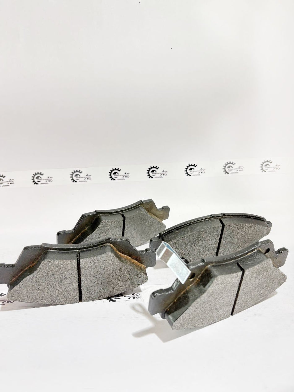 CarTrends brake pad showing friction surface and mounting hardware for vehicle braking system.
