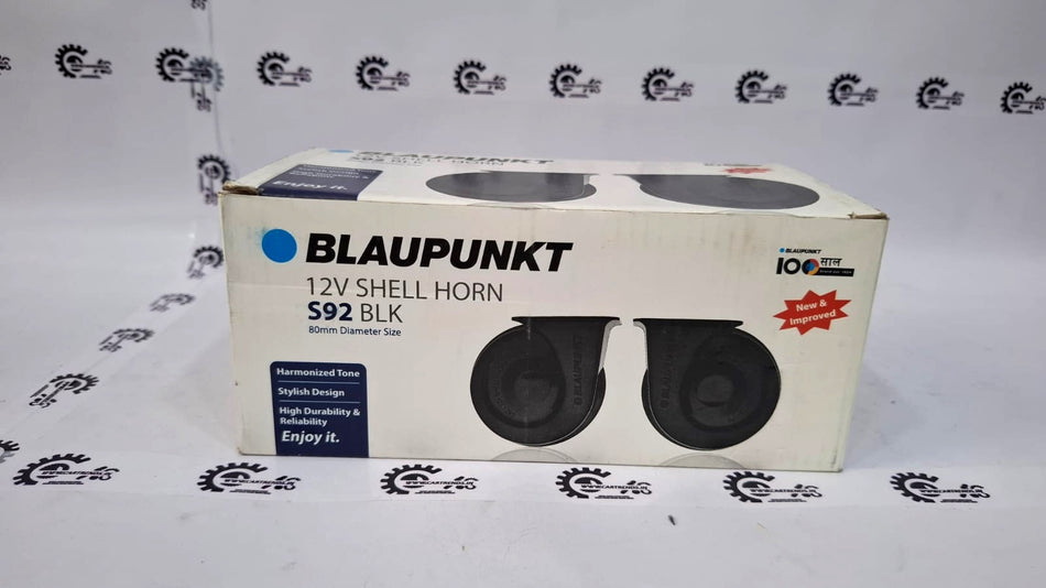 Blaupunkt 12V Shell Horns Model S92 BLK installed in a vehicle, featuring black plastic housing and dual-tone design.