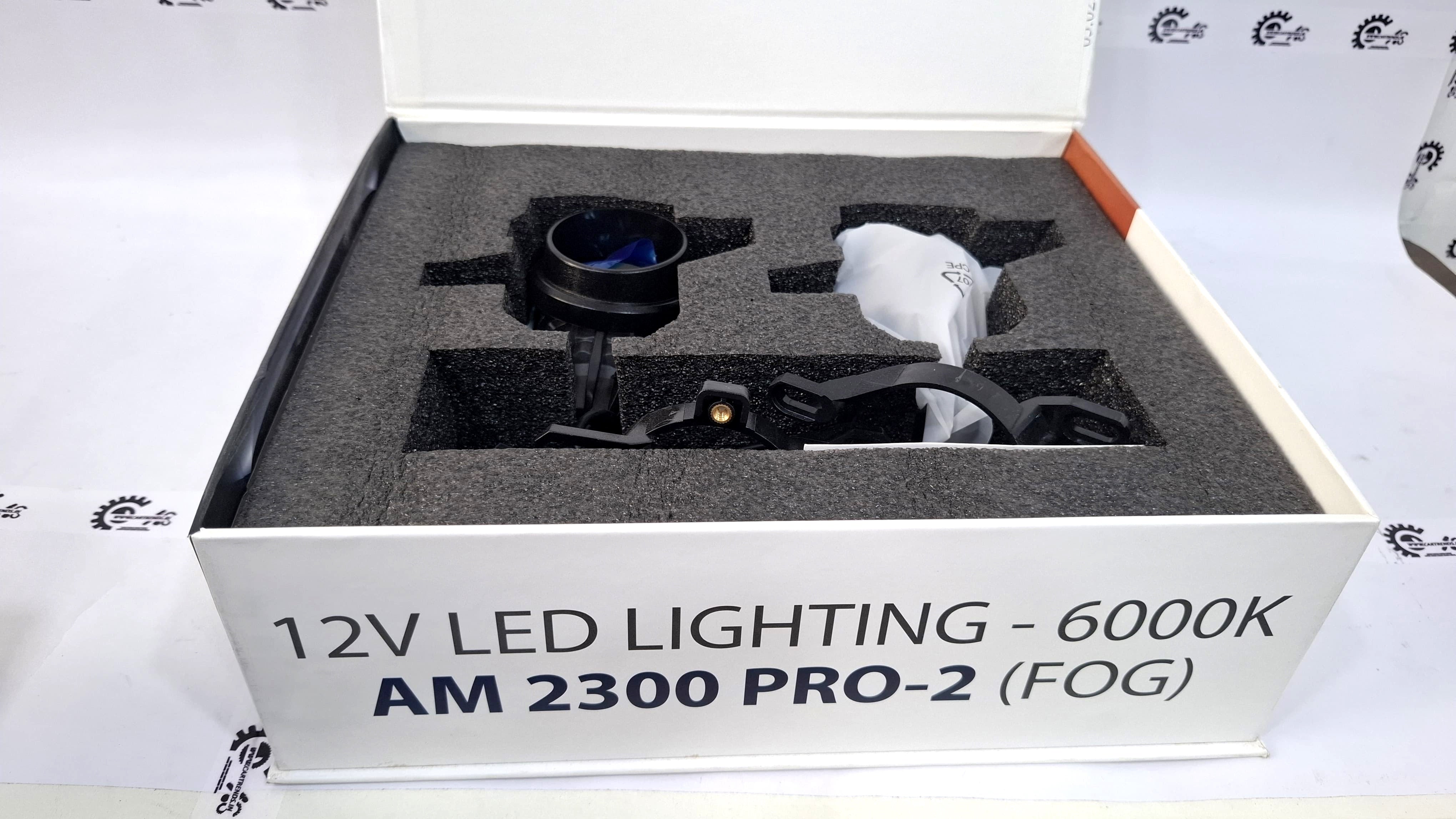 Blaupunkt AM 2300 PRO-2 LED fog lamps installed on a vehicle, showcasing their sleek design and bright illumination.