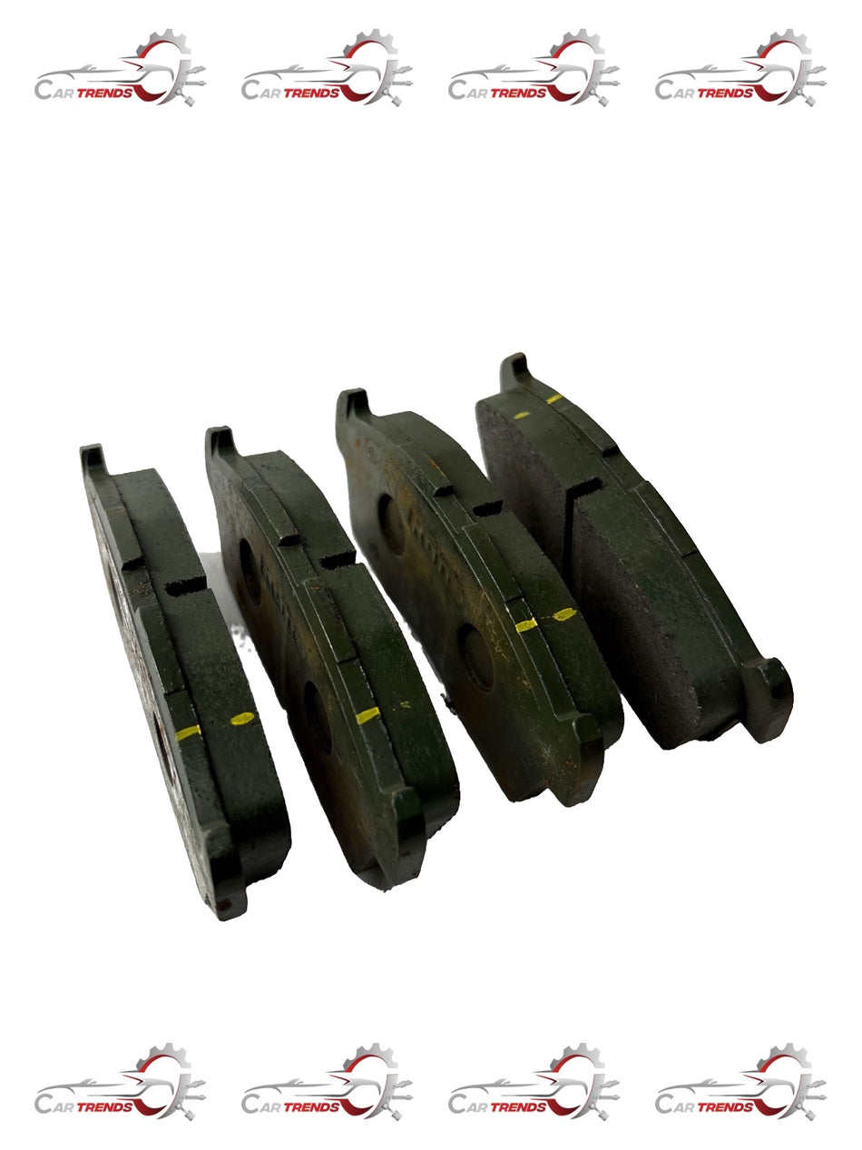 CarTrends disc brake pad shown with metal backing and friction surface for vehicle braking system.