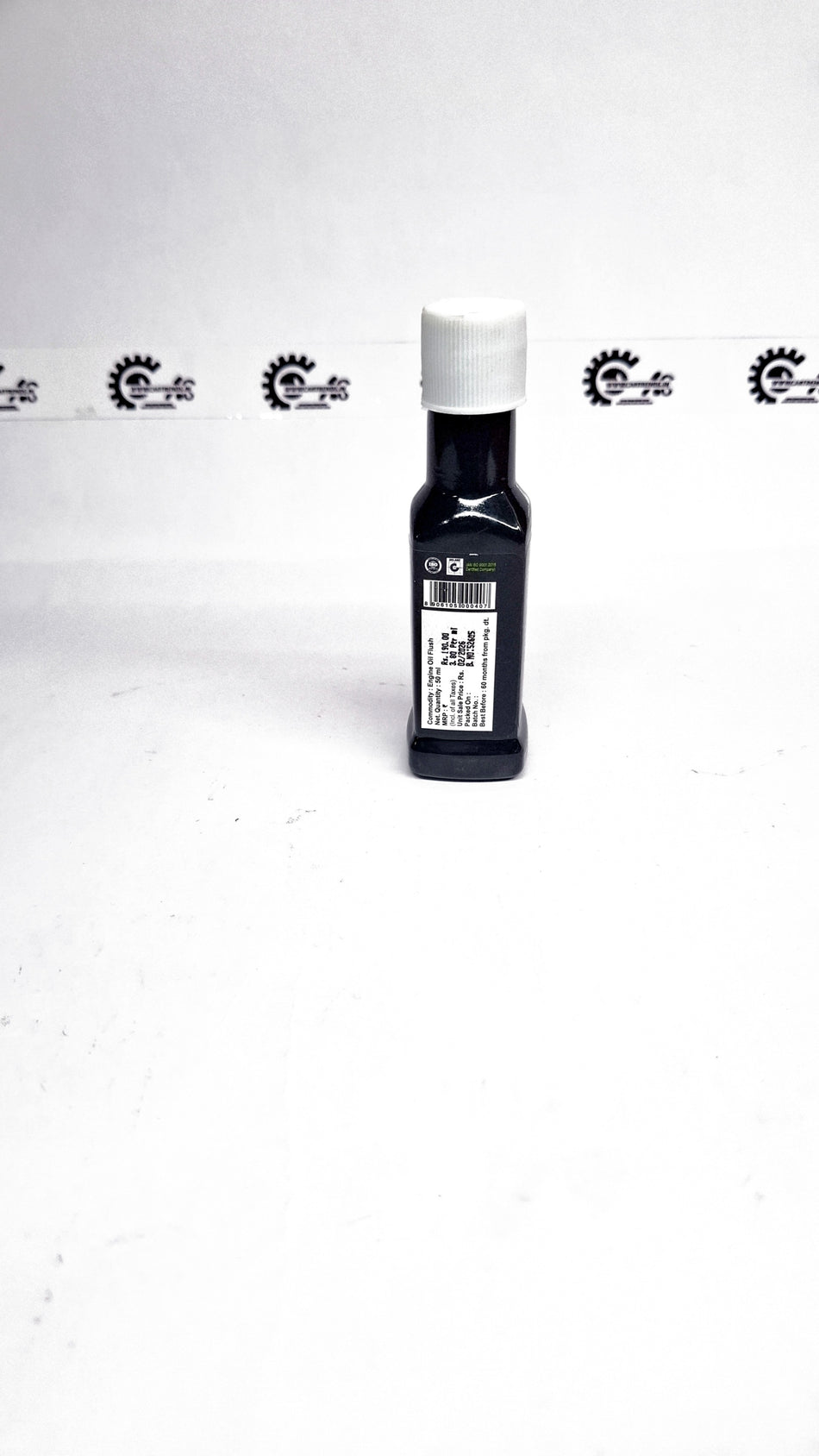 CarTrends Engine Oil Flush bottle showing label and cap, used for cleaning engine oil systems during maintenance.