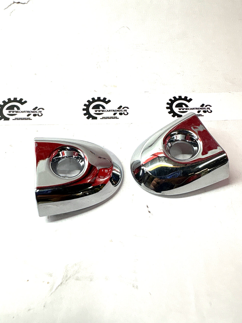 CarTrends escutcheon, a decorative metal or plastic cover for vehicle keyholes or locks, shown in the image.