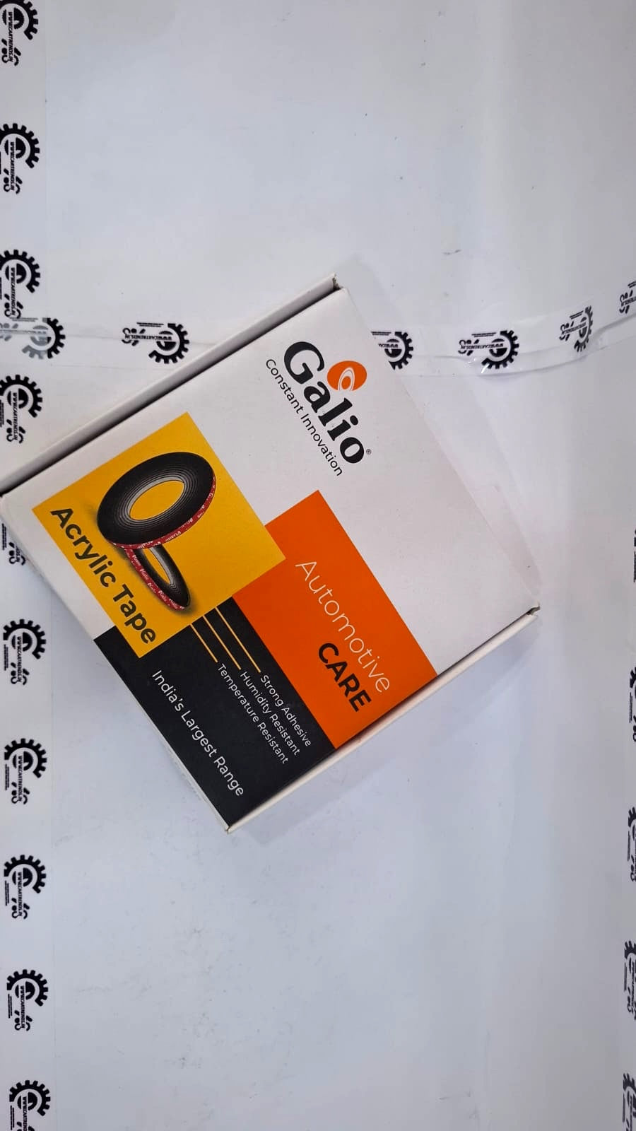 CarTrends Galio Acrylic Tape shown in a close-up, highlighting its clear, strong adhesive qualities for automotive or craft use.