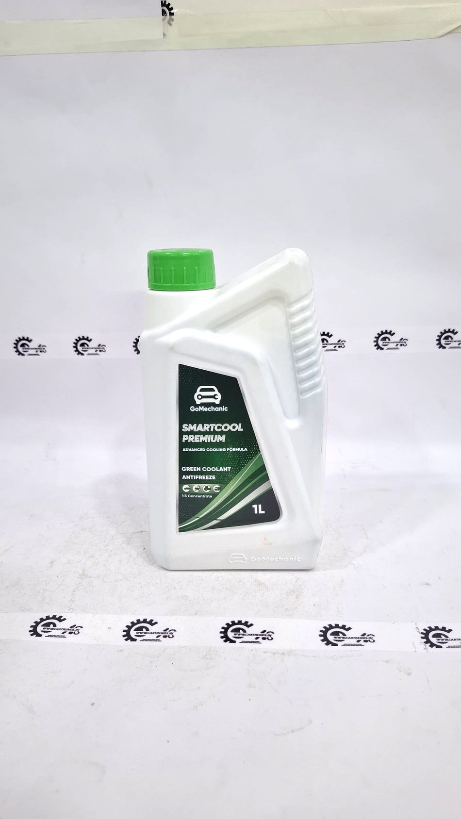 CarTrends GoMechanic Smartcool Premium green automotive coolant and antifreeze in a container with a label.