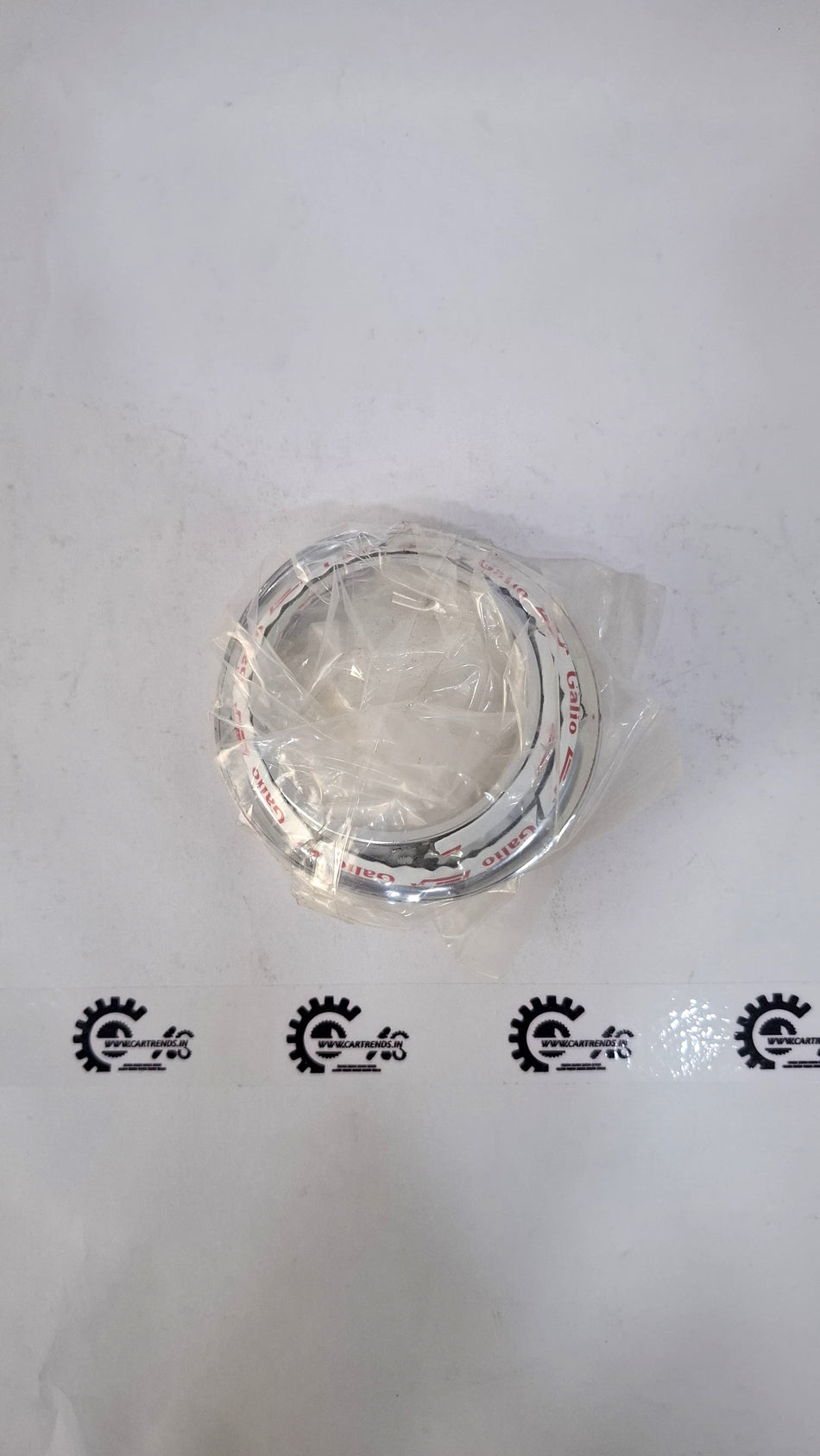CarTrends Indiacator Garnish for vehicle decoration, featuring a sleek metallic finish and intricate design details.
