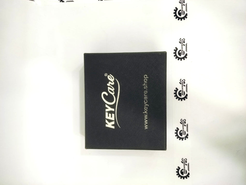 CarTrends Key Care Cover protecting car key with durable material, designed for a secure fit and stylish appearance.