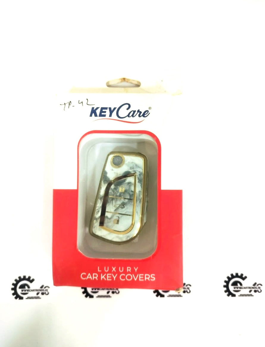 CarTrends Key Care Cover protecting car keys with a durable, sleek design, shown on a modern key fob.