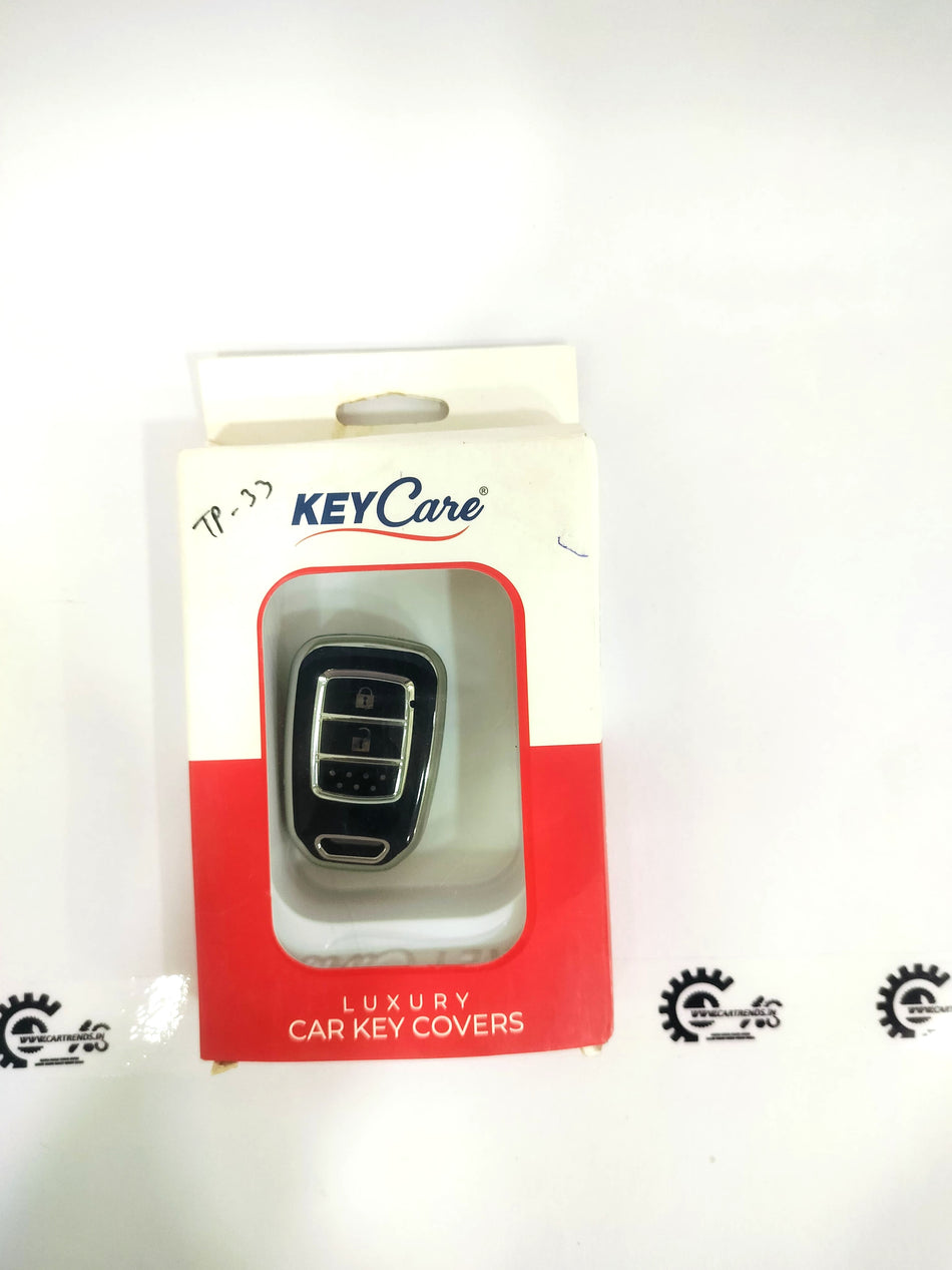 CarTrends Key Care Cover, a protective silicone cover for car keys, shown in black with textured surface for secure grip.