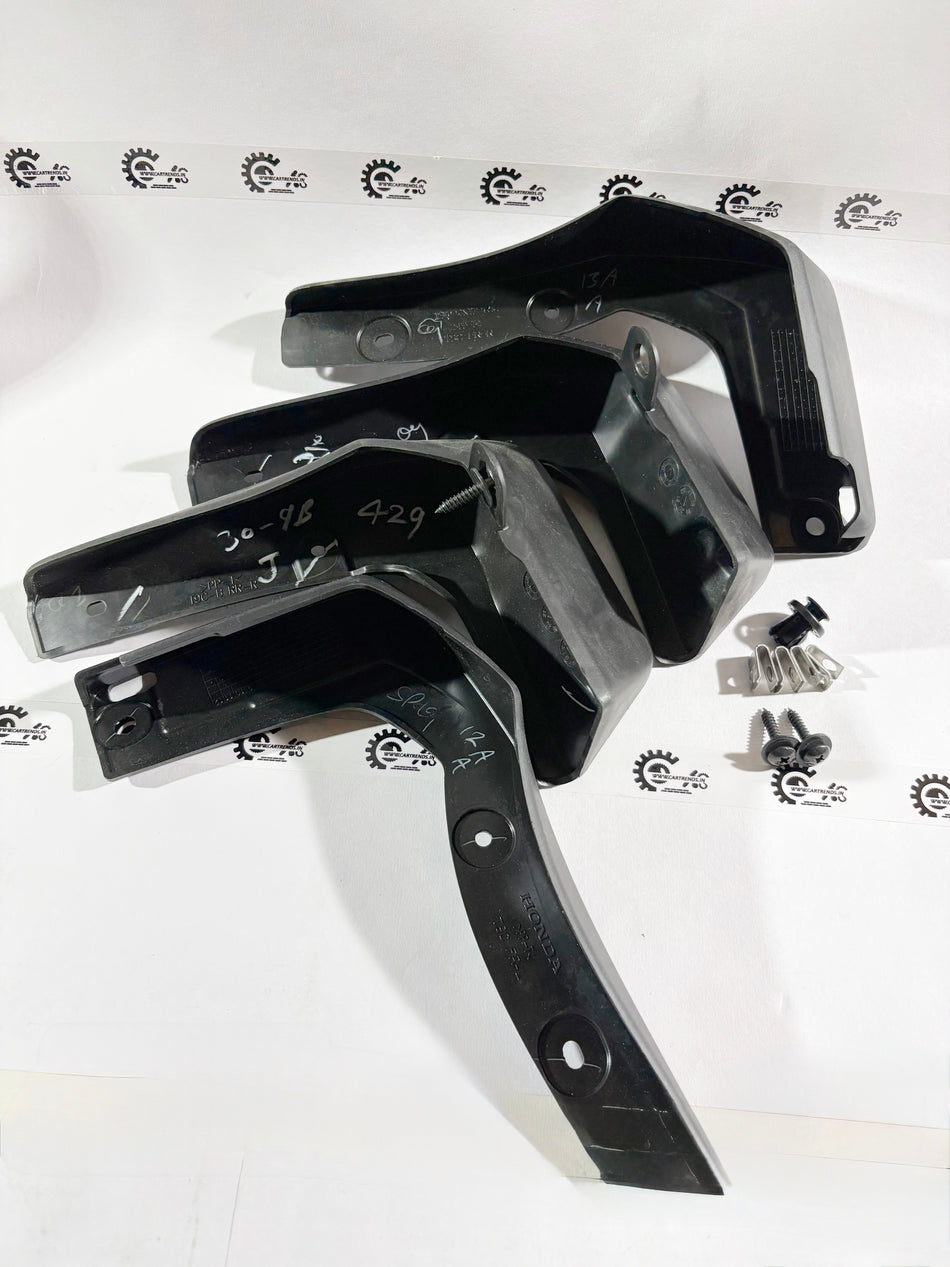 CarTrends mud guard kit 08P00T9A7000, durable black plastic mud guard set for vehicle protection, shown installed on car wheel.