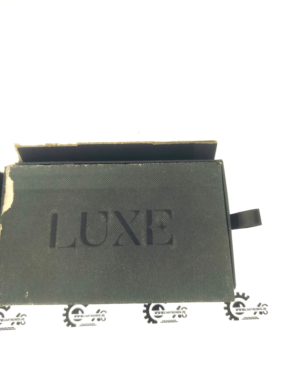 CarTrends Luxe Series key cover with chain, showcasing a sleek and stylish protective key accessory with metal chain attachment.