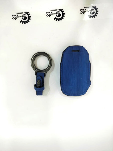 CarTrends Luxe Series key cover with chain, black leather and metal accents, designed to protect and stylishly hold car keys.