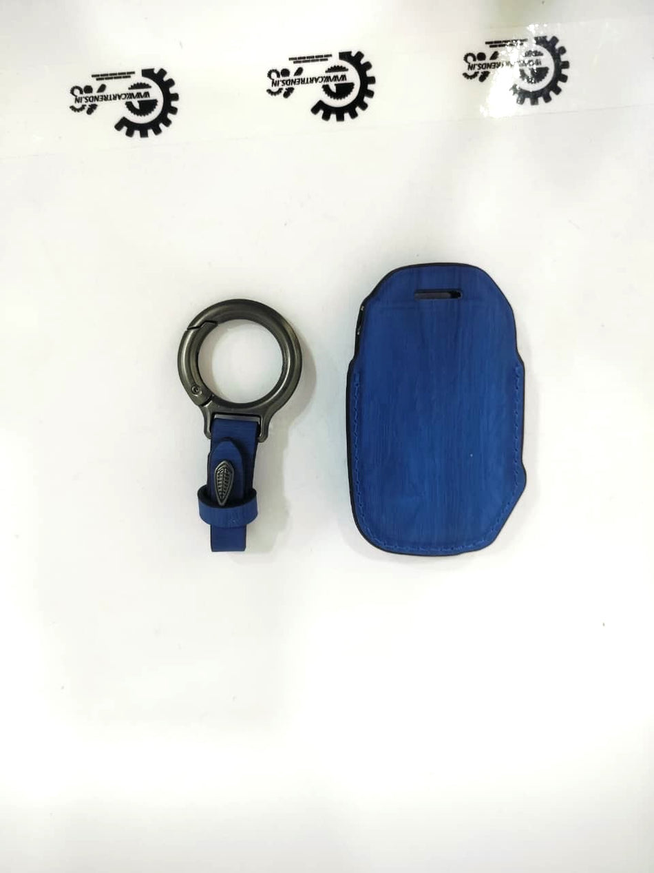 CarTrends Luxe Series key cover with chain, black leather and metal accents, designed to protect and stylishly hold car keys.