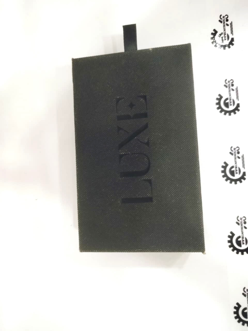 CarTrends Luxe Series key cover and chain set, stylish leather key protector with silver chain for added security and elegance.