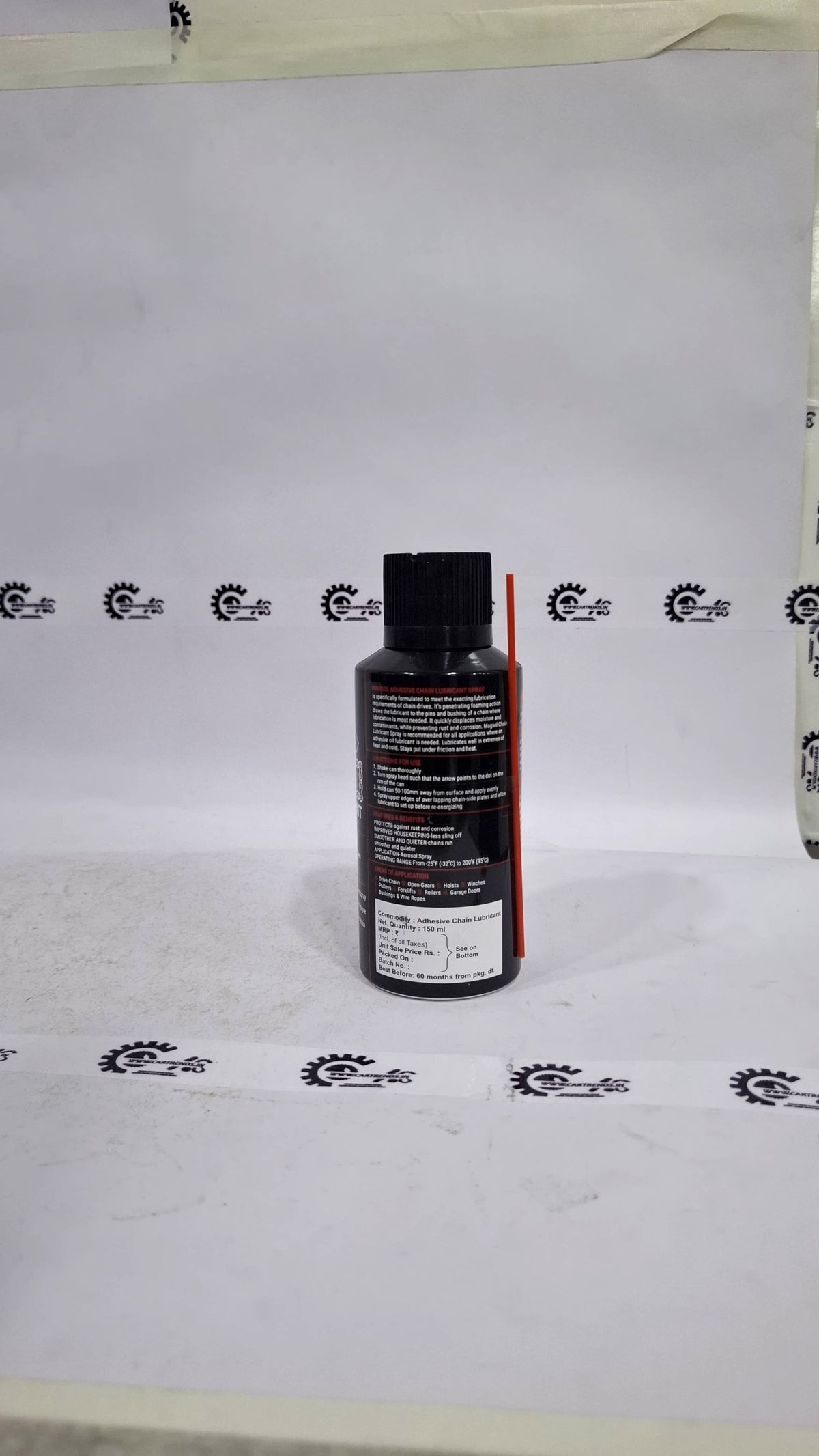 CarTrends Magsol Adhesive Chain Lubricant spray visible in the image, showing the aerosol can with branding and product label.